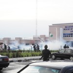 SECURITY MEN  DISPERSE YOUTHS WHO INVADED NASARAWA STATE  ASSEMBLY
DURING GOV. UMARU AL-MAKURA'S VISIT TO THE ASSEMBLY ON TUESDAY. PHOTO: NAN