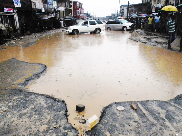 PHOTO NEWS: Streets flooded after rain in Lagos