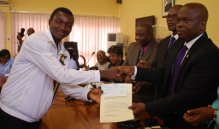 FASHOLA’S MEDIA AIDE PRESENTS CHEQUE TO ATHLETE