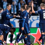 Real Madrid's Portuguese forward Cristiano Ronaldo celebrates after scoring the opening goal with his teammates during the UEFA Champions League first-leg Group A football match between Malmo FF and Real Madrid CF at the Swedbank Stadion, in Malmo, Sweden on September 30, 2015.  AFP PHOTO / JONATHAN NACKSTRANDJONATHAN NACKSTRAND/AFP/Getty Images ORG XMIT: 575430483 ORIG FILE ID: 544873030