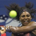 Serena Williams of the U.S. hits a return to compatriot Bethanie Mattek-Sands during their third round match at the U.S. Open Championships tennis tournament in New York, September 4, 2015.  REUTERS/Adrees Latif