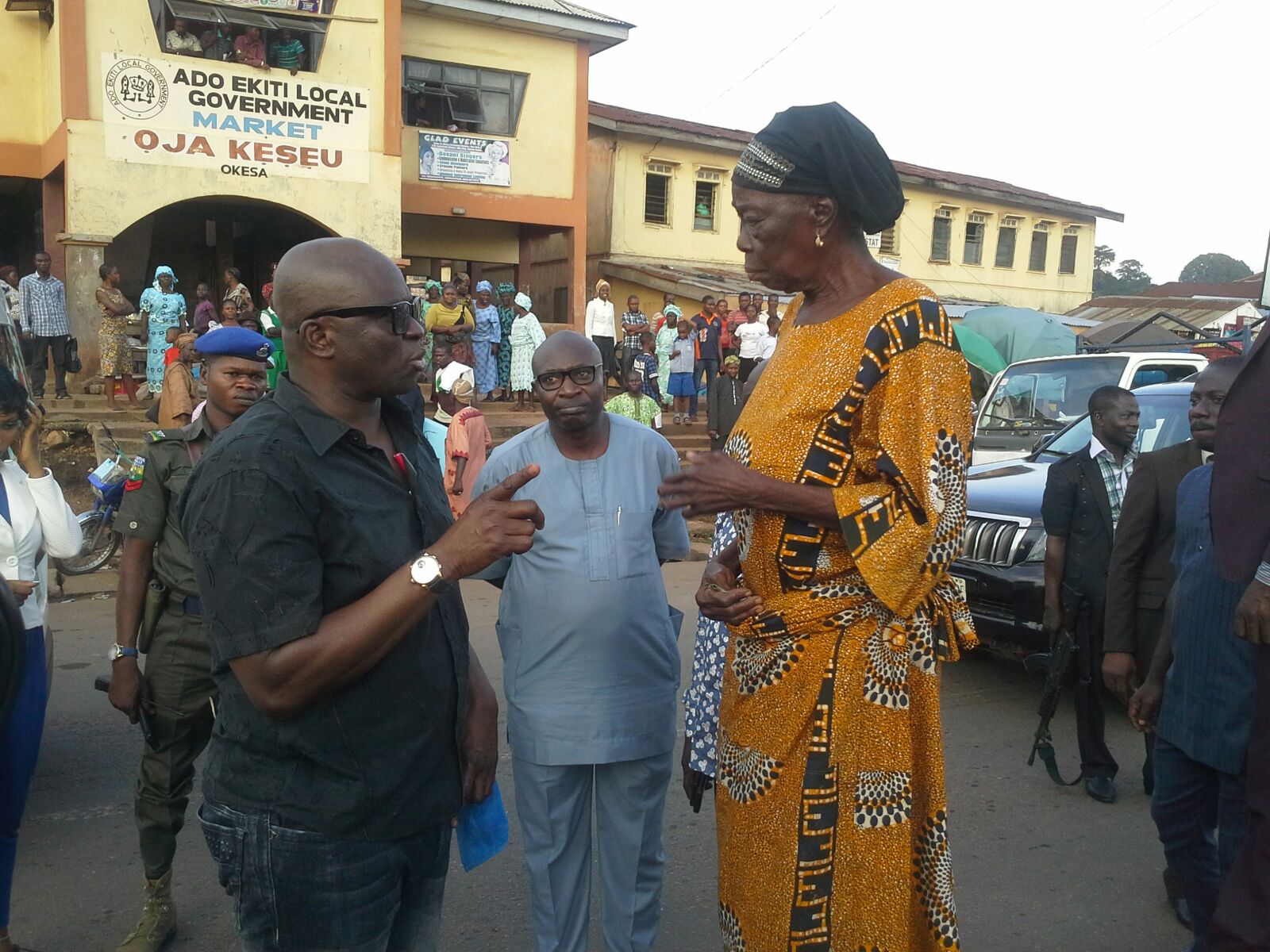 Fayose assists old woman