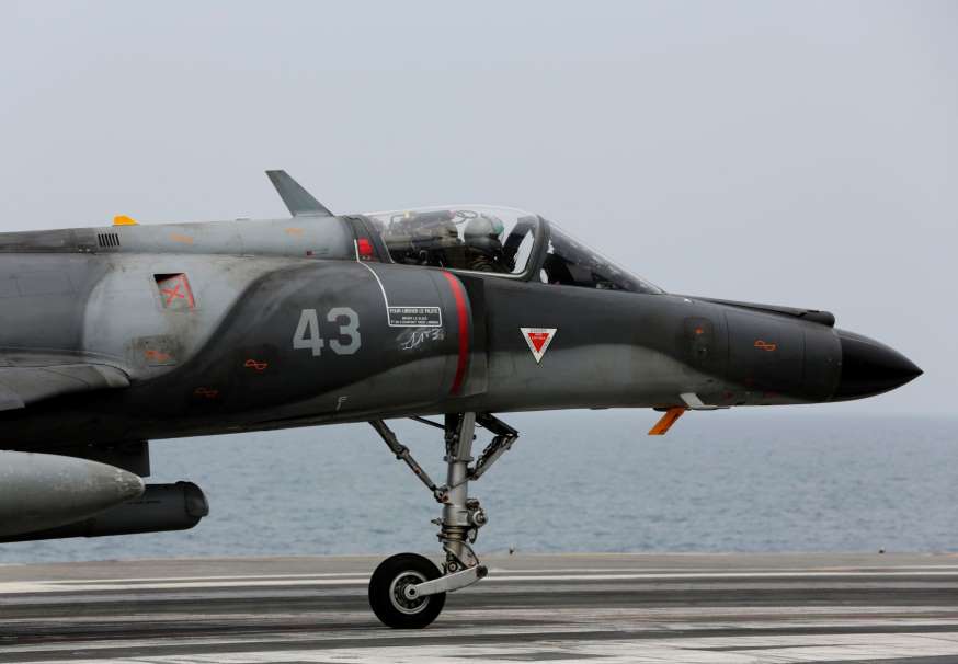 Attacks: France launches air strikes in Syria as Paris investigation widens