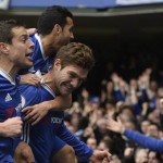 Britain Football Soccer - Chelsea v Arsenal - Premier League - Stamford Bridge - 4/2/17 Chelsea's Marcos Alonso celebrates scoring their first goal with team mates Reuters / Hannah McKay Livepic EDITORIAL USE ONLY. No use with unauthorized audio, video, data, fixture lists, club/league logos or "live" services. Online in-match use limited to 45 images, no video emulation. No use in betting, games or single club/league/player publications.  Please contact your account representative for further details.