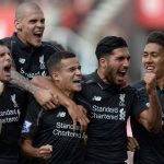 (L-R) Liverpool's English midfielder James Milner, Liverpool's Slovakian defender Martin Skrtel, Liverpool's Brazilian midfielder Philippe Coutinho, Liverpool's German midfielder Emre Can and Liverpool's Brazilian midfielder Roberto Firmino celebrate after Coutinho scores the opening goal of the English Premier League football match between Stoke City and Liverpool at the Britannia Stadium in Stoke-on-Trent, central England on August 9, 2015. Liverpool won the game 1-0. AFP PHOTO / OLI SCARFF
RESTRICTED TO EDITORIAL USE. No use with unauthorized audio, video, data, fixture lists, club/league logos or 'live' services. Online in-match use limited to 75 images, no video emulation. No use in betting, games or single club/league/player publications..        (Photo credit should read OLI SCARFF/AFP/Getty Images)
