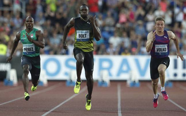Bolt holds on to win 100 metres at final Golden Spike
