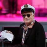 FILE PHOTO -  Hugh Hefner, founder of Playboy magazine, twirls a napkin during a performance by Dr. John and the Lower 911 at the 30th annual Playboy Jazz Festival at the Hollywood Bowl in Hollywood, California June 14, 2008.  REUTERS/Fred Prouser/File Photo