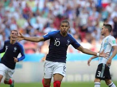 Mbappe brace edges France past Argentina
