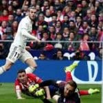 Real Madrid back in La Liga title fight after derby victory