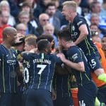 Ruthless Manchester City survive scare to retain EPL title