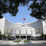 China cuts loan rate for first time since 2016, seeks to soothe bond market
