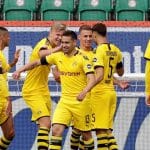 Dortmund ease past Wolfsburg 2-0 to stay in title hunt