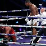 Joshua knocks out Pulev to retain heavyweight titles