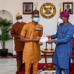 Sanwo-Olu hands over cheque to LASU Best Graduating student