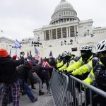 Six arrested as pro-Trump protesters clash with police