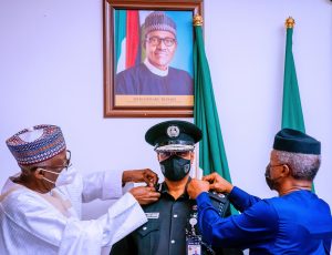Osinbajo decorates Baba as Acting IGP