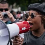 Black British female activist in critical condition after shooting