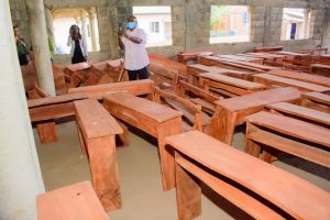 Apomu Descendants Union donates furniture  to schools in Apomu 