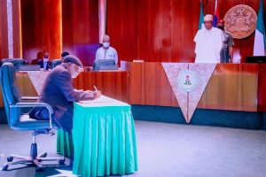 Buhari swears in Justice Ariwoola as Ag. CJN