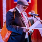 Buhari swears in Justice Ariwoola as Ag. CJN