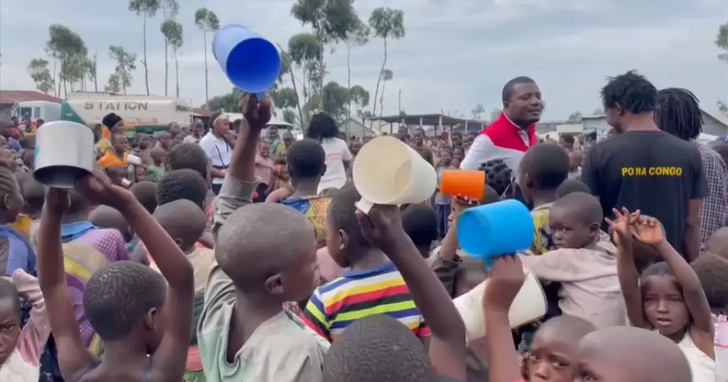 Volunteers serve porridge, bread to east Congo’s displaced children