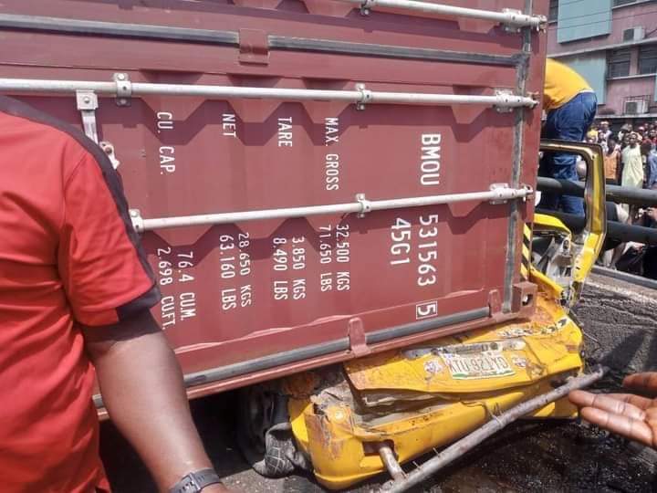 Container falls off truck in Lagos, crushes nine passengers to death