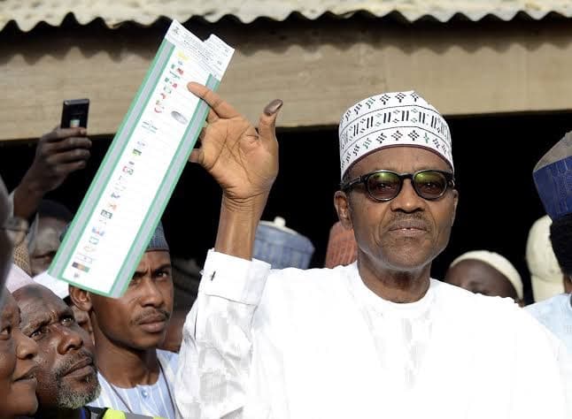 Buhari: ‘I voted APC’, displays ballot papers