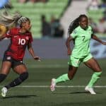 Canada's Ashley Lawrence, left, and Nigeria's Antionette Payne battle for the ball during the Women's World Cup Group B soccer match between Nigeria and Canada in Melbourne, Australia, Friday, July 21, 2023. (AP Photo/Hamish Blair)