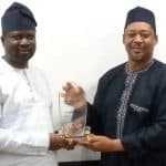 Kogi State Commissioner for Finance, Budget and Economic Planning, Asiru Idris (left), receiving the first position award for Fiscal Transparency and Accountability from the Chairman, Sub-National Budget Transparency Network, Dr. Mahmud Jibrin, at the 2022 Transparency and Accountability survey report launch, in Lokoja...on Tuesday.