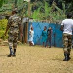 Soldiers patrol in Bafut, after the roof of a school's dormitory was set to fire overnight, on November 15, 2017, in the northwest English-speaking region of Cameroon.
Authorities in Cameroon have imposed a night-time curfew on November 8, 2017 and ordered the closure of shops and public places in the main city in a region rocked by unrest among the country's anglophone minority. Four makeshift bombs exploded overnight on November 12, a week after four soldiers were killed in the two administrative areas where most of Cameroon's anglophone minority live. Their deaths have been blamed by the authorities on "terrorists" -- anglophones campaigning for the two English-speaking areas, the Northwest and Southwest Regions, to secede from Cameroon.  / AFP PHOTO / -        (Photo credit should read -/AFP via Getty Images)