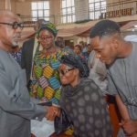 L-R: Ogun State Governor, Prince Dapo Abiodun; wife of the deceased Director of Finance and Administration, Governor's Office, Mrs. Kehinde Oyekanmi; son of the deceased, Damilola, during the Memorial Service held for Taiwo Oyekanmi at the Ibara Baptist Church, Abeokuta...on Wednesday.