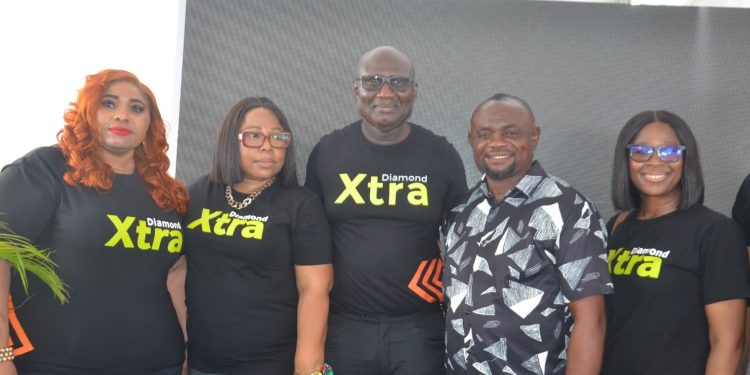 L–R: Doris Okpara, Product Manager, DiamondXtra; Ngozi Igboanugo, Regional sales Manager Festac 1&2 & mainland Access Bank; Bolarinwa Animashaun, Regional Sales Director Lagos 2 Access Bank ; Emeka Ezikeugo, Diamondxtra N200,000 Onsite winner; and Adaeze Ume, Head Consumer liabilities, Access Bank during the launch of Diamondxtra Season 16 held at Alaba International Market, Lagos.