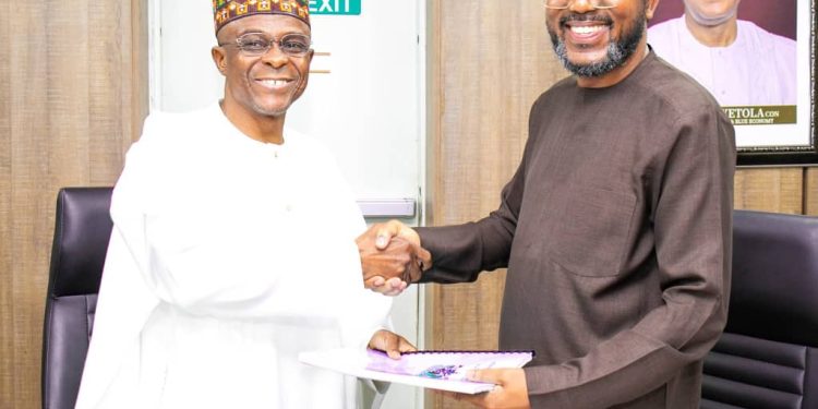 The outgoing Managing Director of the Nigerian Ports Authority, Mohammed Koko (right) handing over to the new Managing Director, Dr. Abubakar Dantsoho, at the NPA headquarters in Lagos...on Monday