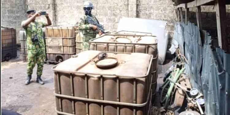 Alt="Nigerian Navy officer on duty"