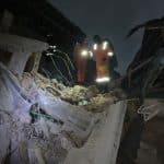 Alt="Collapsed building Scene"