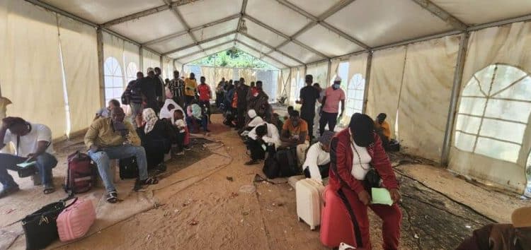 Alt="Repatriated immigrant from Libya"