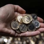 Alt="First £1 coins to feature King Charles enter circulation in UK"