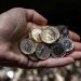 Alt="First £1 coins to feature King Charles enter circulation in UK"
