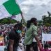 Alt="#Endbadgovernance protesters"