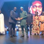 2024 Winner of The Nigeria Prize for Literature, Familoni Olubunmi (R) receives his plaque from Olakunle Osobu, Deputy MD, NLNG, at the Grand Award Night. With them are (L-R)  Prof Ahmed Yerima (Board member), Dr Philip Mshelbila, NLNG MD, Prof Akachi Adimora-Ezeigbo (Chairman) and Prof Olu Obafemi, (Board member) of the Literature Prize Advisory Board