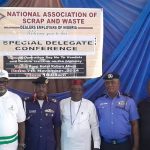 Alt="L-R: The Representative of the Ministry of Steel Development, Mr Fredrick Ewa, Deputy Commandant Adebayo Bello of NSCDC, the President of NASWDEN, Mr John Obeh and ACP Sule Abel representing the IGP at the Extraordinary Special Delegates Conference of the NASWDEN"
