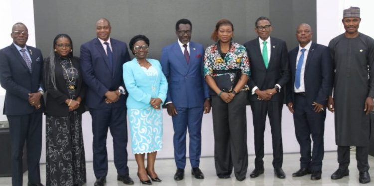 Alt="NAICOM management and top insurance operators at the 16th Insurers Committee meeting in Lagos"