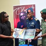 L-R: Olamide Adedeji, Nigerian Rapper, Singer and Songwriter; AVM Abidemi Marquis, Chairman,  Local Organising Committee, Africa Military Games Abuja (AMGA) 2024 and Major General Maikano Abdullahi, President, Africa Military Sport Organisation, at the unveiling of Olamide as the Brand Ambassador of African Military Games Abuja 2024, held in Lagos...on Wednesday.