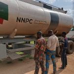 Alt="The suspects and the NNPCL truck NSCDC arrests NNPCL truck driver for diverting 10,000 litres fuel"