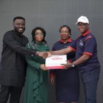 NLNG’s representatives, Titi Horsfall (second left) and Chukwuemeka Onuoha (first left) receive FIRS’ most compliant taxpayer award conferred on NLNG from Dr. Lovette Ononuga, FIRS’ Director of Taxpayers Service and Mr. Olurotimi I. Akingbade, Director, Lagos Mainland East, State Coordinator in Lagos...on Friday.