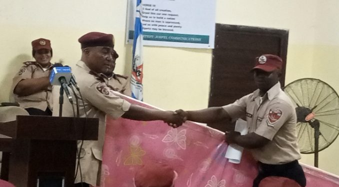 FRSC Lagos Sector Commander, Kehinde Hamzat (left) presenting a gift to Habib Sayidi