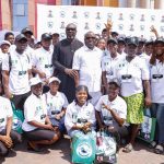Special Assistant to the National Security Adviser on Niger Delta, Mr Goodluck Ebelo (middle left), and the Administrator of the Presidential Amnesty Programme, Dr Dennis Otuaro (middle right), in a group photograph with PAP scholarship students during the orientation programme for 1,700 scholarship beneficiaries deployed for the 202/2025 academic session in Warri, Delta State...on Friday.