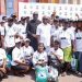 Special Assistant to the National Security Adviser on Niger Delta, Mr Goodluck Ebelo (middle left), and the Administrator of the Presidential Amnesty Programme, Dr Dennis Otuaro (middle right), in a group photograph with PAP scholarship students during the orientation programme for 1,700 scholarship beneficiaries deployed for the 202/2025 academic session in Warri, Delta State...on Friday.
