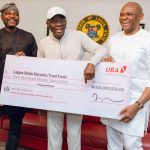 L-R: Group Deputy Managing Director, United Bank for Africa (UBA), Muyiwa Akinyemi; Lagos State Governor, Babajide Sanwo-Olu; and Group Chairman, UBA, Mr. Tony Elumelu, during the presentation of N500m to Lagos State Security Fund by UBA Foundation, the corporate social responsibility arm of UBA, held at Lagos House, Marina...on Sunday.
