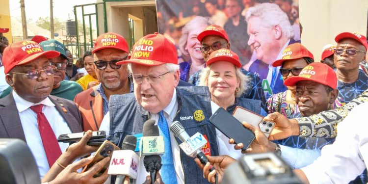 L-R: Past District Governor/Chairman of the Committee on Trustees Visit to Nigeria, PDG Victor Onukwuga; the Chairman of the Board of Trustees, Rotary International Foundation/former President of Rotary International, Mark Moloney; Partner of Trustee Chair, Rotary Foundation, Gay Blackburn Maloney; Past District Gov and Chairman  Nigeria National Polio Eradication Committee, Joshua Hassan, with others, during a symbolic polio immunisation, held at Primary healthcare Jahi Village Ndawuse, in Abuja.
